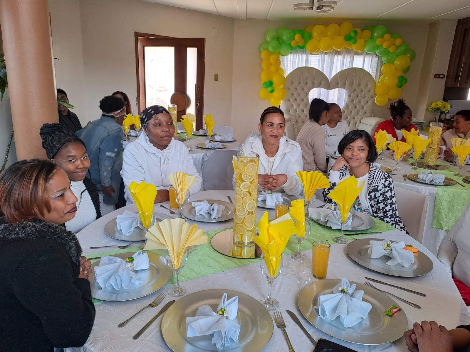 Women gathered around a table during the event